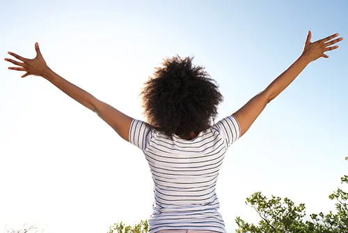 Person feeling relief due to acupuncture and chiropractic